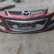Бампер Mazda CX-7 оригинальный номер EH45-501T1
