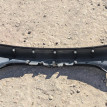 Накладка 5-й двери Toyota Yaris оригинальный номер 76801-K0010