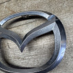 Значок Мазда 3 BL 2010- эмблема переднего бампера Mazda 2 оригинальный номер C23551731
