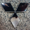 Эмблема Тpи Pомба Митцубиси Mitsubishi оригинал Mitsubishi i оригинальный номер 7415А368 MN146116