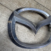 Значок Мазда 3 BL 2010- эмблема переднего бампера Mazda 2 оригинальный номер C23551731