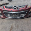 Бампер Mazda CX-7 оригинальный номер EH45-501T1