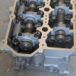 Головка блока цилиндров Mitsubishi L200 оригинальный номер 1005C643