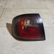 Фонарь задний наружный левый Nissan Primera оригинальный номер 265559F628