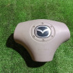 Подушка безопасности в рулевое колесо Mazda 2 оригинальный номер B28V57K00