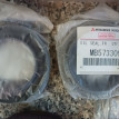 Сальник ступицы передней внутренний Митцубиси Mitsubishi Colt оригинальный номер MB573309 MB303875