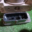Блок ABS (насос) Mitsubishi Lancer оригинальный номер MR569441