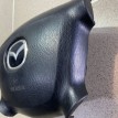 Подушка безопасности водителя Mazda Familia 2001 г Mazda 2 оригинальный номер B25F57K00