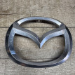 Значок Мазда 3 BL 2010- эмблема переднего бампера Mazda 2 оригинальный номер C23551731