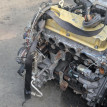 Двигатель Mitsubishi Grandis оригинальный номер 1000A254