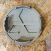 Колпачок литого диска Mitsubishi MR554097 оригинал Mitsubishi Lancer оригинальный номер mr554097