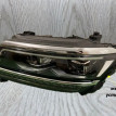 Накладка фары левой Volkswagen Tiguan 2 Volkswagen Tiguan оригинальный номер 1402000011