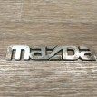 Эмблема на крышку багажника Mazda Capella 