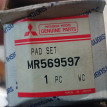 Колодки тормозные дисковые передние Митцубиси Л200 Mitsubishi i оригинальный номер MR569597