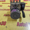 Блок ABS (насос) Mazda 6 оригинальный номер 1338006980