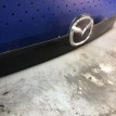 Накладка крышки багажника Mazda Cx-7 под камеру Mazda 2 оригинальный номер eg2150811