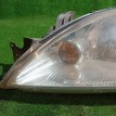 Фара левая Mitsubishi Lancer 