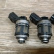 Форсунка инжекторная электрическая Nissan Presea оригинальный номер 1660053J00