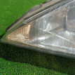 Фара левая Ford Focus оригинальный номер 1152091