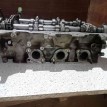 Головка блока левая Land Rover Discovery 276DT Land Rover Discovery оригинальный номер 4r8q6c064