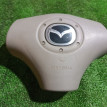 Подушка безопасности в рулевое колесо Mazda 2 оригинальный номер B28V57K00