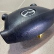 Подушка безопасности водителя Mazda Familia 2001 г Mazda 2 оригинальный номер B25F57K00