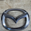 Значок Мазда 3 BL 2010- эмблема переднего бампера Mazda 2 оригинальный номер C23551731