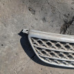 Решетка радиатора Toyota Corolla оригинальный номер 53111-1A390