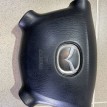 Подушка безопасности водителя Mazda Familia 2001 г Mazda 2 оригинальный номер B25F57K00