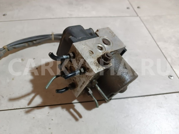 Блок ABS (насос) Nissan Pulsar оригинальный номер 4760040Y00