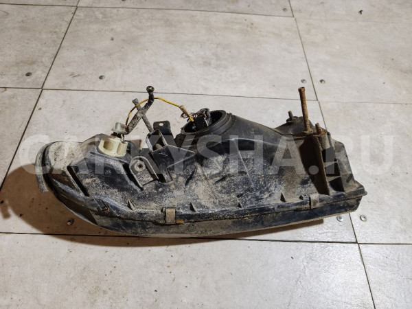 Фара левая Nissan Bluebird оригинальный номер B60600E701