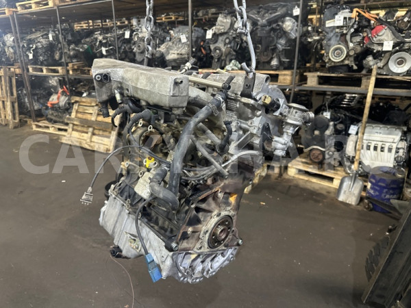 Двигатель Audi A4 06B100032X AMB Audi 100 