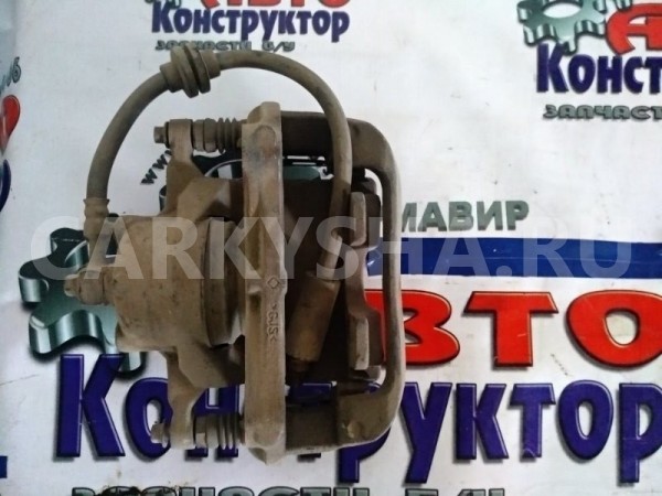 Суппорт тормозной Opel Astra 