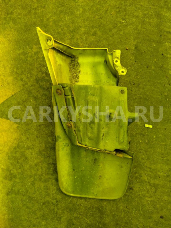 Клык бампера Mitsubishi Pajero оригинальный номер MR335724