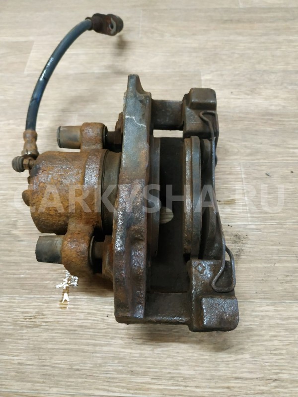 Суппорт тормозной передний правый Ford Focus 