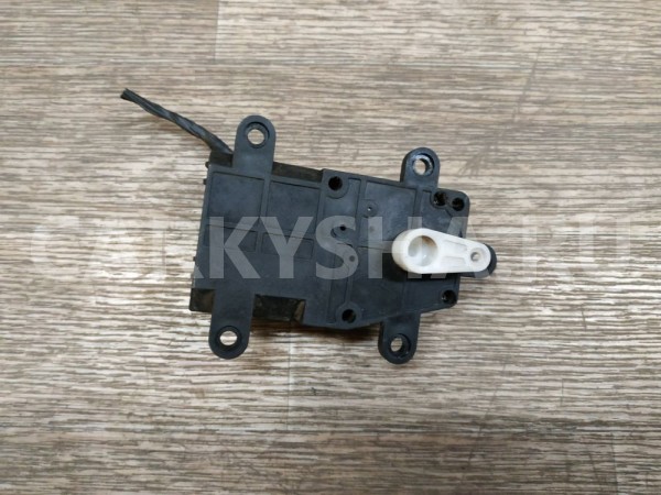 Моторчик заслонки отопителя Kia Shuma 