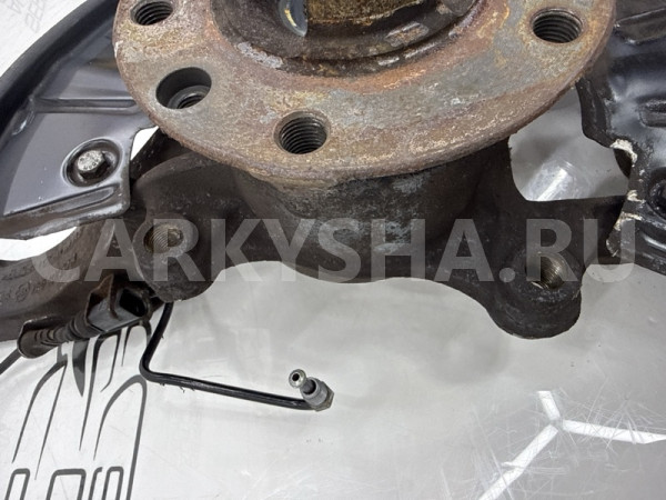 Поворотный кулак передний левый Volkswagen Touareg Volkswagen Touareg 