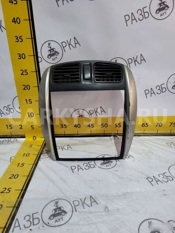 Консоль центральная Mazda Premacy Mazda 2 оригинальный номер C10055210B04