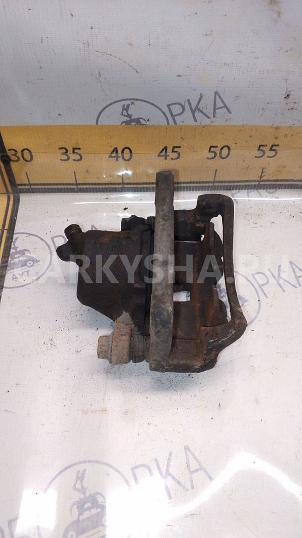 Суппорт тормозной Mitsubishi Lancer VI Mitsubishi i 