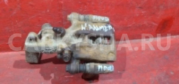 Суппорт задний правый Nissan Almera N16 Альмера Nissan Almera 