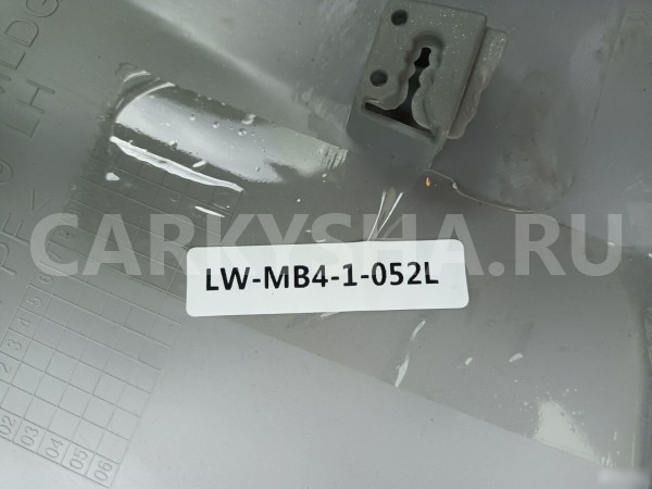 Накладка переднего крыла левого Митцубиси Паджеро Mitsubishi i оригинальный номер LW-MB4-1-052-L