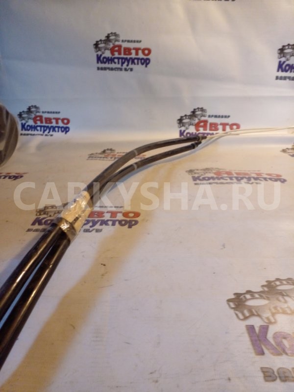 Трос стояночного тормоза Skoda Rapid 