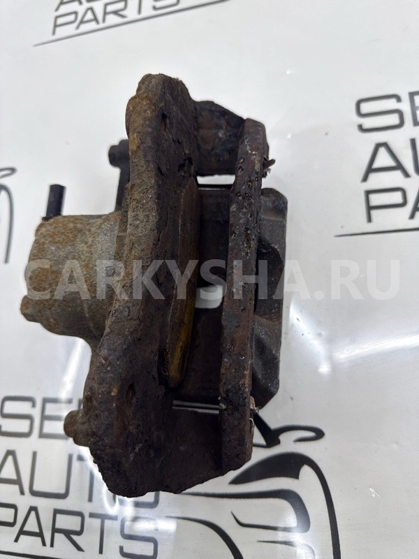 Суппорт передний левый Mitsubishi Lancer 9 CS3A Mitsubishi Lancer 