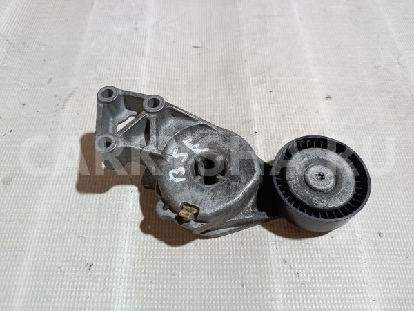 Натяжитель приводного ремня Volkswagen Passat оригинальный номер 06A903315F
