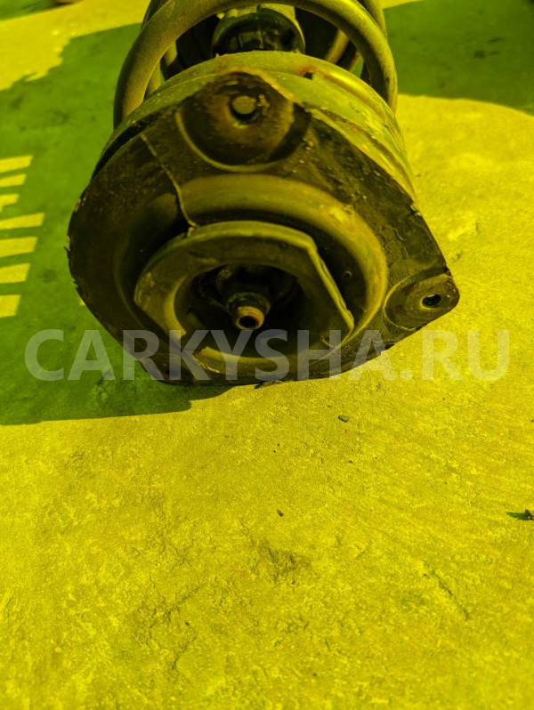 Стойка амортизатора Nissan NV200 оригинальный номер E4302JX50A
