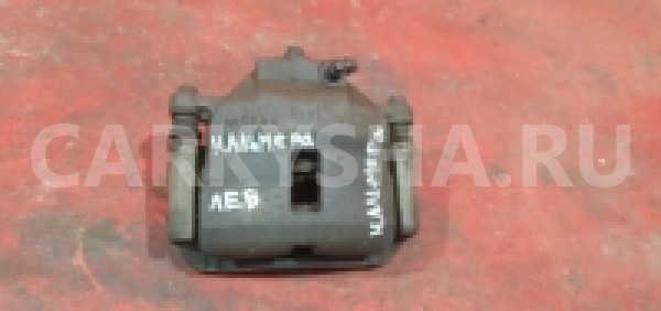 Суппорт передний левый Nissan Almera N16 Альмера Nissan Almera 