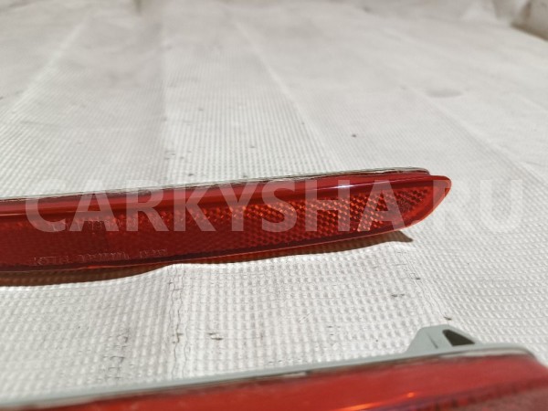 Отражатель в бампер задний левый Mazda 6 