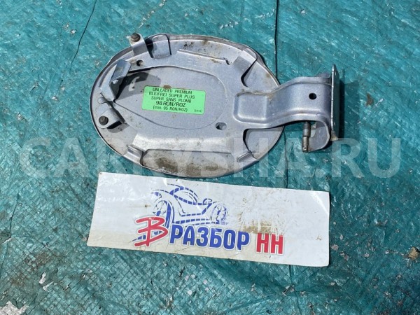 Лючок бензобака Mazda CX-7 I (2006—2009) Mazda 2 оригинальный номер EG2142410B