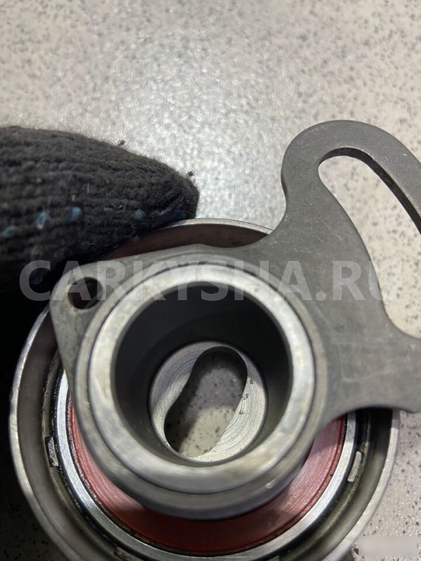 Ролик-натяжитель ремня грм Nissan Laurel 2000 г Nissan Laurel 