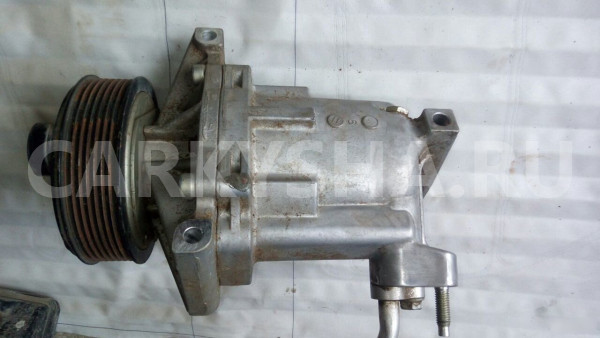 Компрессор системы кондиционирования Ниссан Нотэ Nissan Tiida оригинальный номер 92600CJ70B